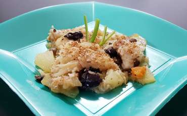 Baccalà in padella con patate, sesamo e olive nere